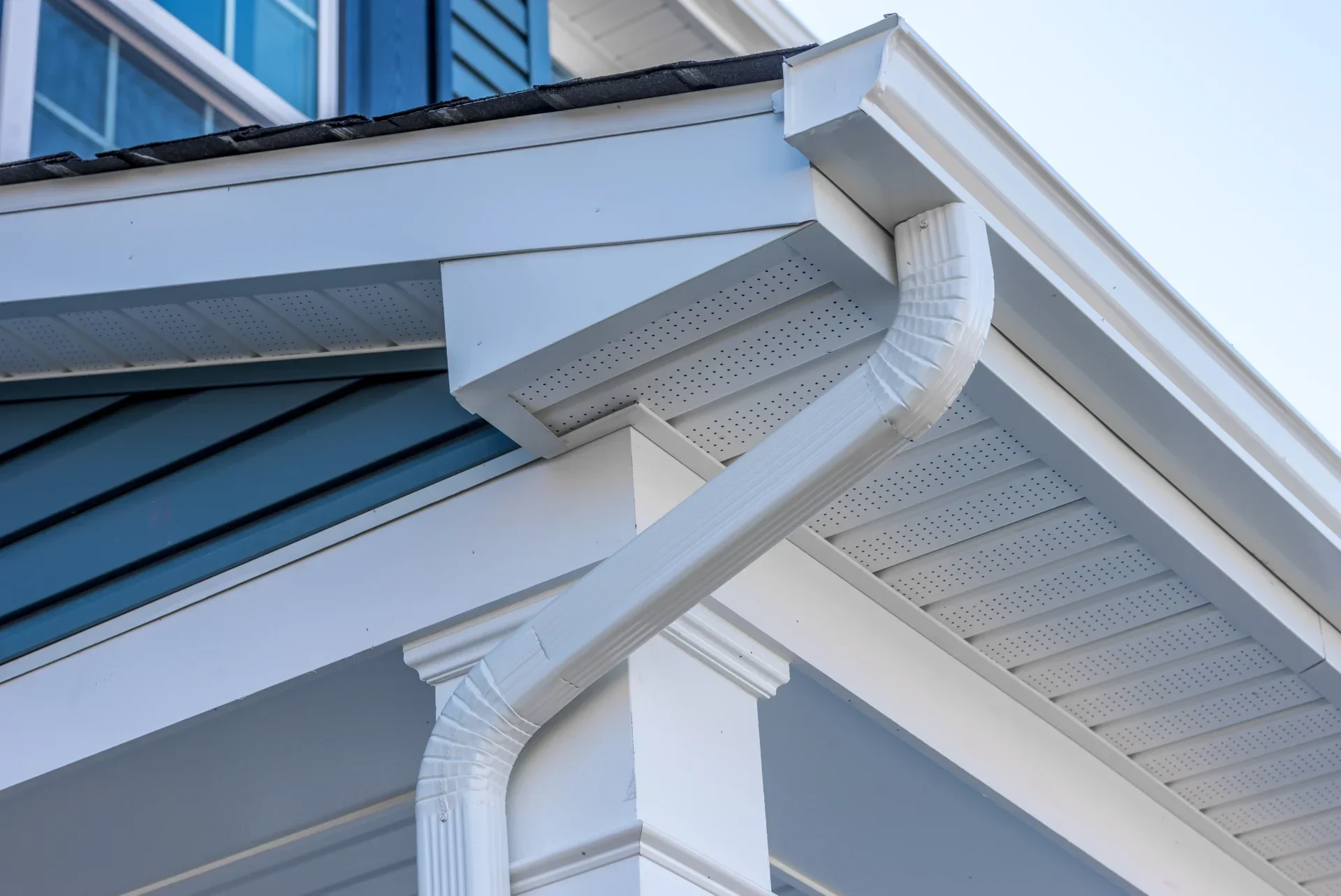 Freshly installed seamless aluminum gutters on a modern Ontario home