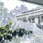 Close-up of leak-free seamless gutter system handling rainwater