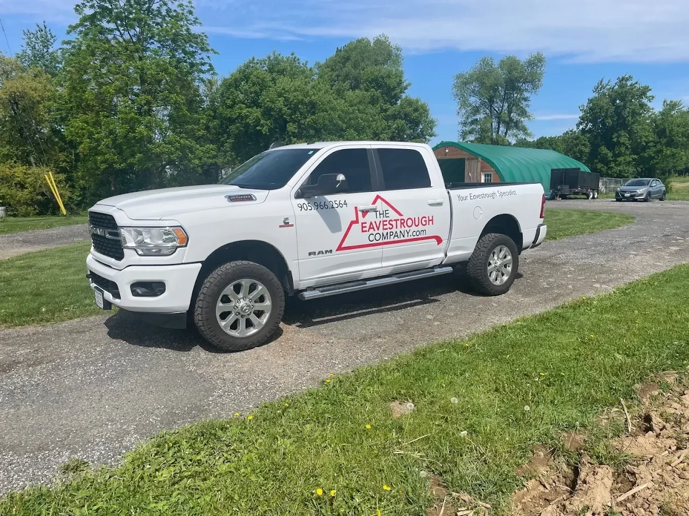 A view of The Eavestrough Company truck from the side