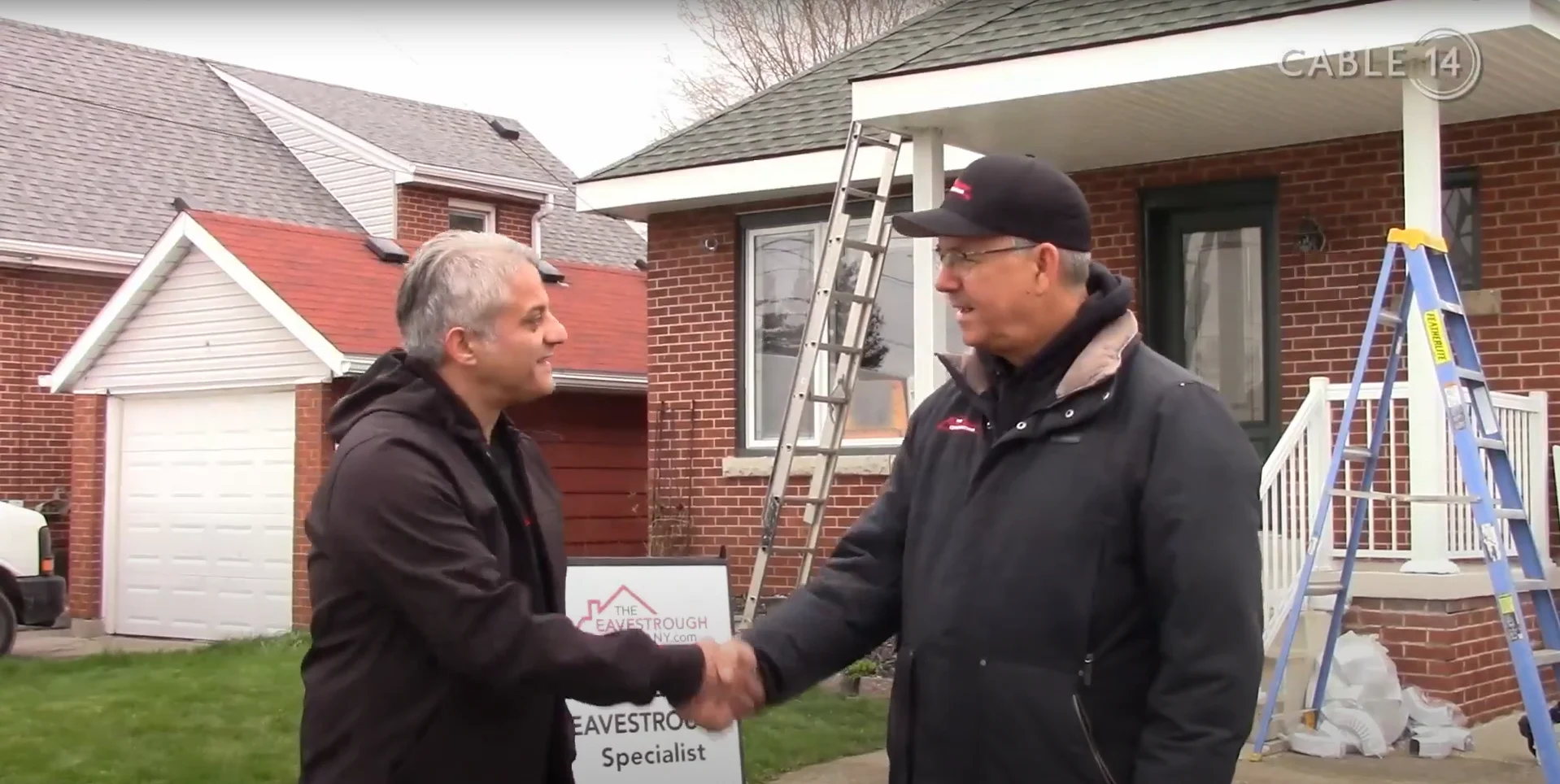 Bob Assadourian and Wendle shaking hands
