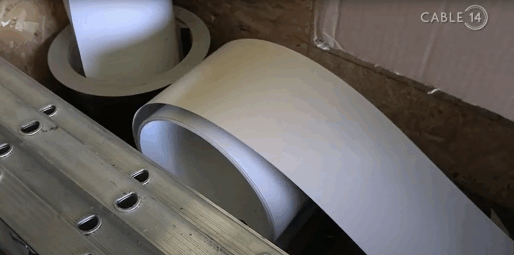 Aluminum coil before running through gutter machine